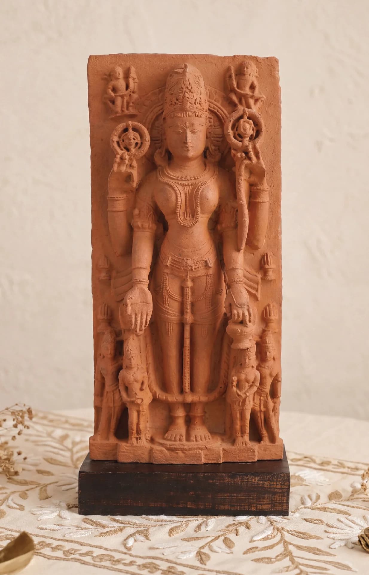 A front-facing view of the Gauri Parvati Sculpture, a hand-finished stone composite replica featuring intricate 10th-century Pratihara temple art details.