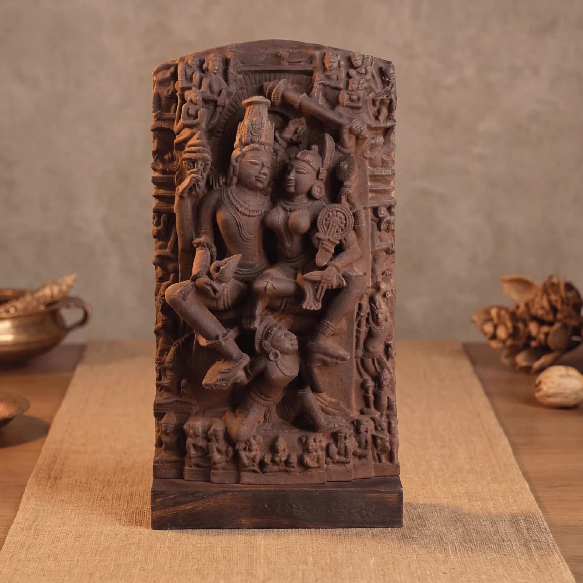 A front view of the Lakshmi Narayan Sculpture, a detailed stone composite replica featuring intricate medieval Hindu iconography.
