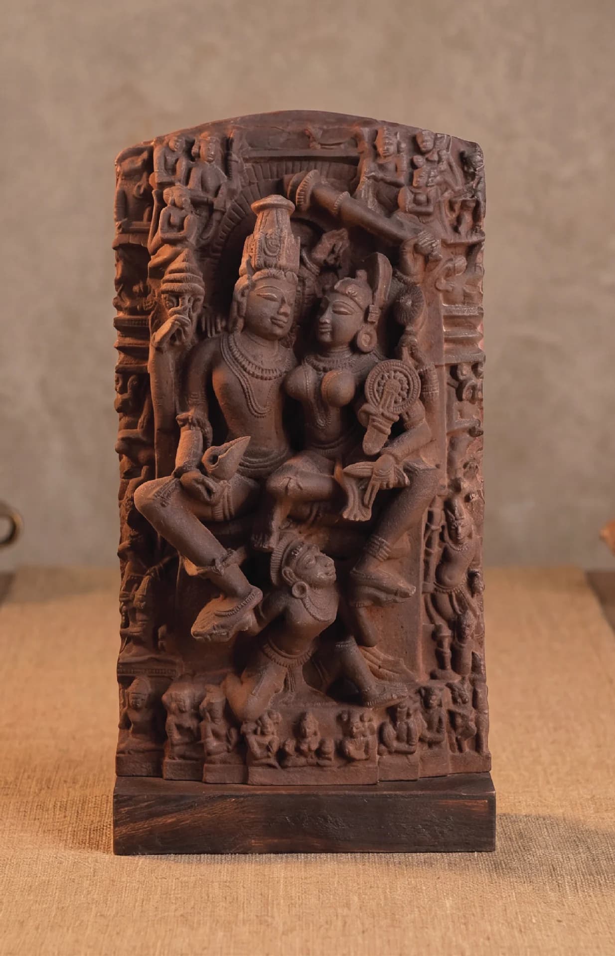 A front-facing view of the Lakshmi Narayan Sculpture, a stone composite replica featuring detailed medieval Hindu iconography.
