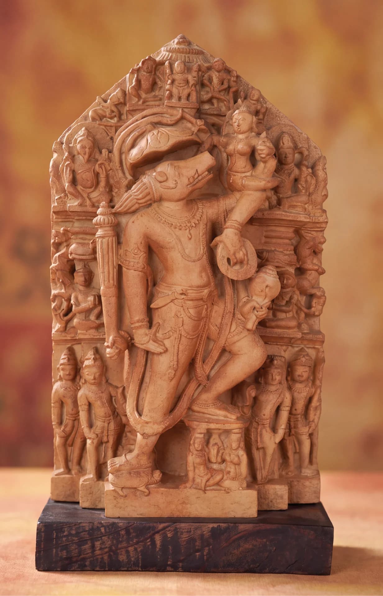 A full front view of the Nar Varaha Sculpture, a detailed stone composite replica showing the man-boar deity Vishnu.